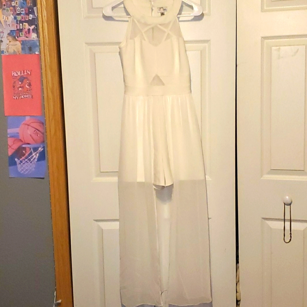 Sweet storm size, small white romper dress.